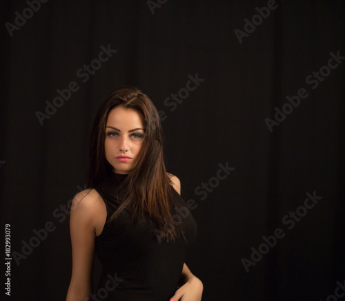 Fashion close up portrait of young sexy beautiful brunette woman with professional makeup.Long hiair and smoky eyes,perfect skin.Hot Girl looking at camera