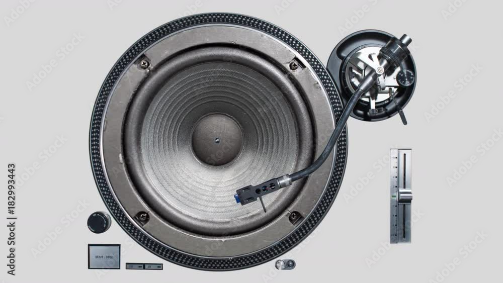 a cutout of a vinyl record player with a video of a pumping speaker in the middle of the plate