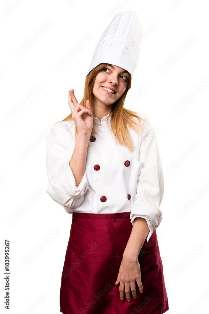 Beautiful chef woman with her fingers crossing Beautiful chef woman with her fingers crossing