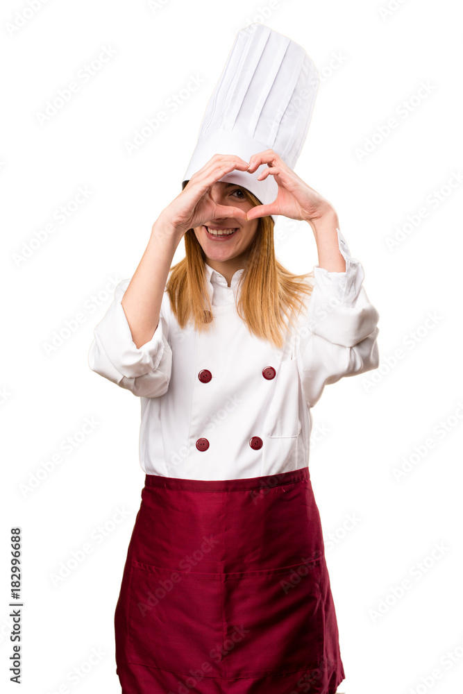 Beautiful chef woman making a heart with her hands Beautiful chef woman making a heart with her hands