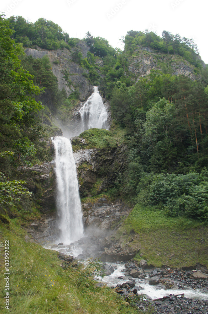The Alpbach Falls waterfall near Meiringen, Switzerland at summer