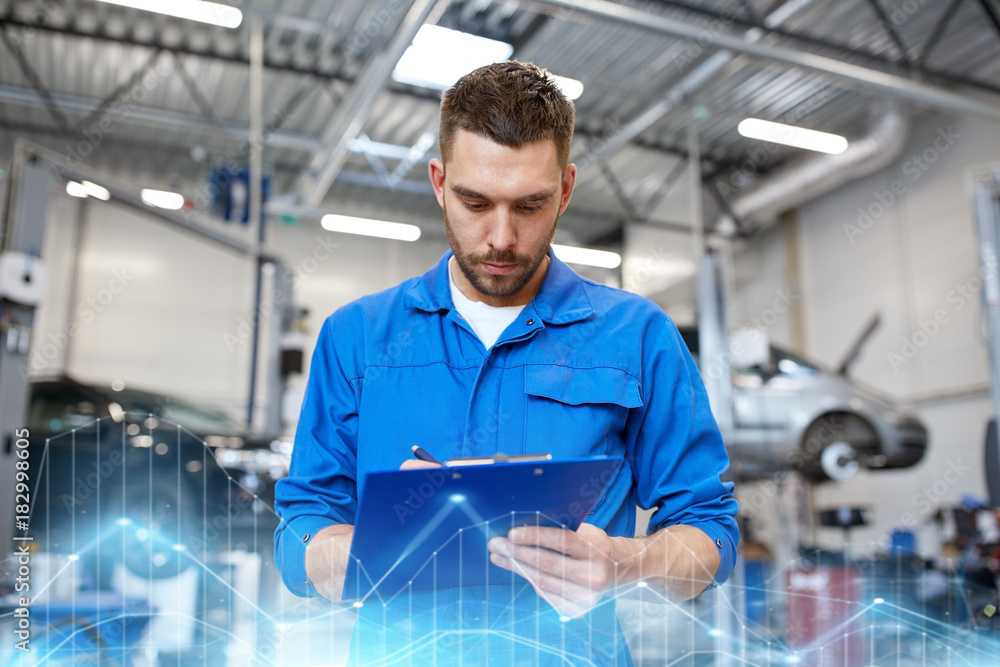 auto mechanic man with clipboard at car workshop auto mechanic man with clipboard at car workshop