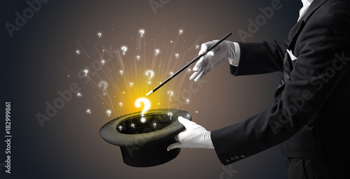 Fotografija Magician conjure question signs from a cylinder