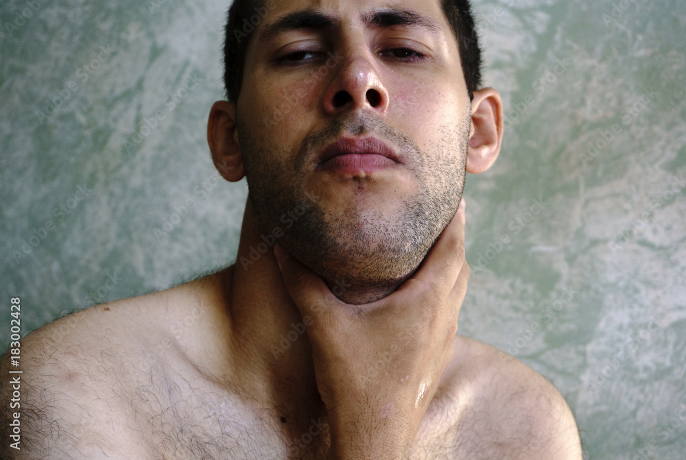 Man with headache and strong sore throat probably has cold Man with headache and strong sore throat probably has cold