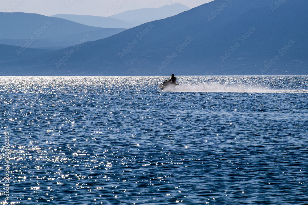 Naklejka premium Jet ski in the distance