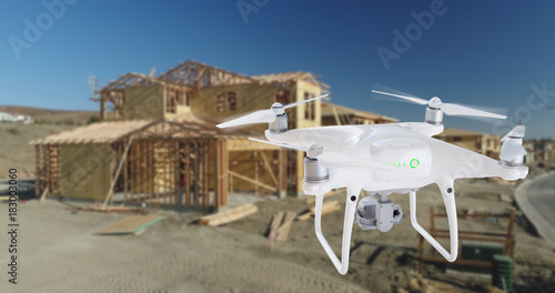 Unmanned Aircraft System  UAV  Quadcopter Drone In The Air Over Construction Site.