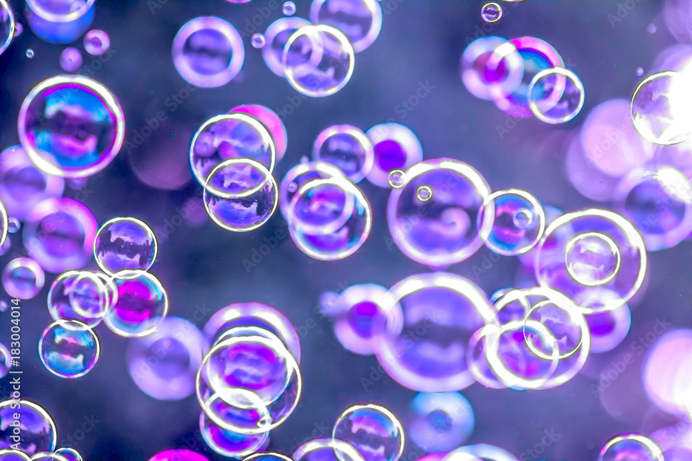 Soap bubbles in nature as background for design blur