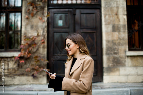Modern woman using mobile p...