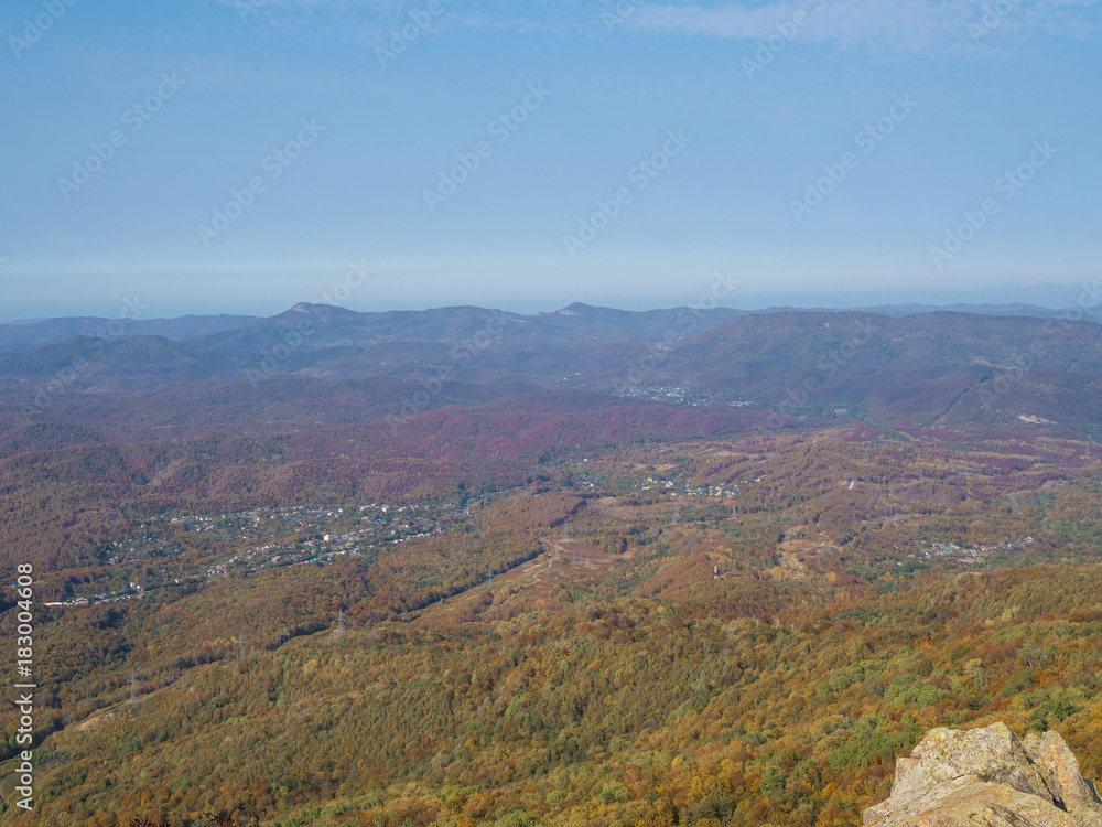 Naklejka premium Weekend in the mountains. Climb to the top through the forest.