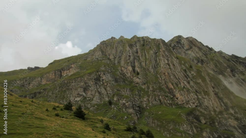 fog rising from the valley of Grindelwald on a giant mountain cliff in swiss Alps Switzerland Bernese Oberland fog rising from the valley of Grindelwald on a giant mountain cliff in swiss Alps Switzerland Bernese Oberland