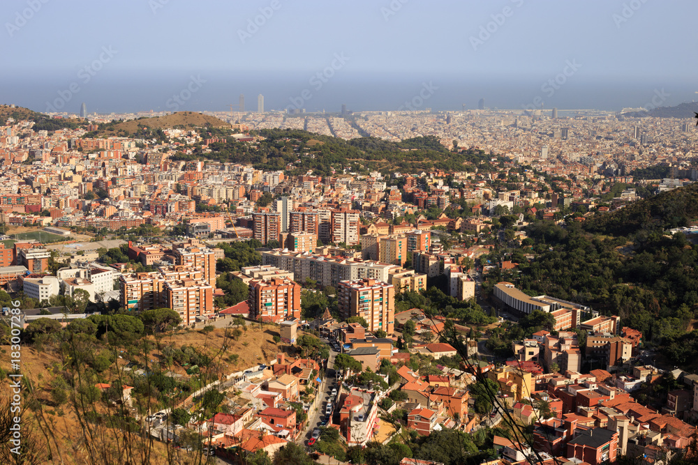 Obraz premium View on Barcelona city and mediterranean sea from Tibidabo hill