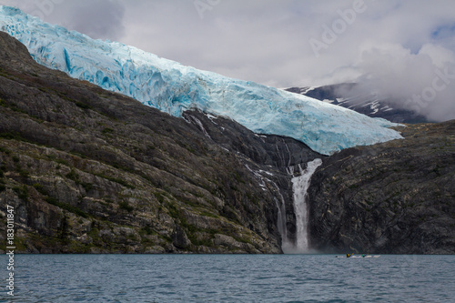 Melting Glacier Water Flowing into the Ocean in Alaska photo