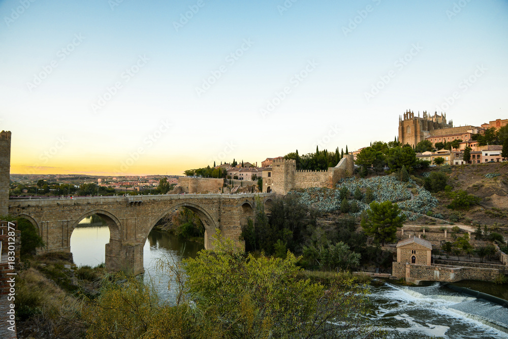 Toledo, Spain - October 10, 2017 : View of old architecture bridge in old town at Toledo. Ancient bridge city in Europe. Spanish museum outdoors.