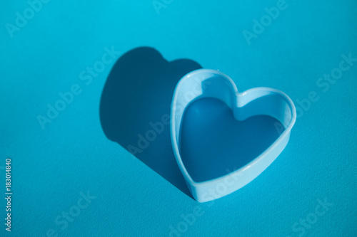 Heart shape on blue background  love symbol
