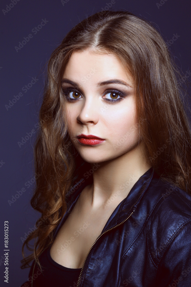 beautiful brunette girl on a black background