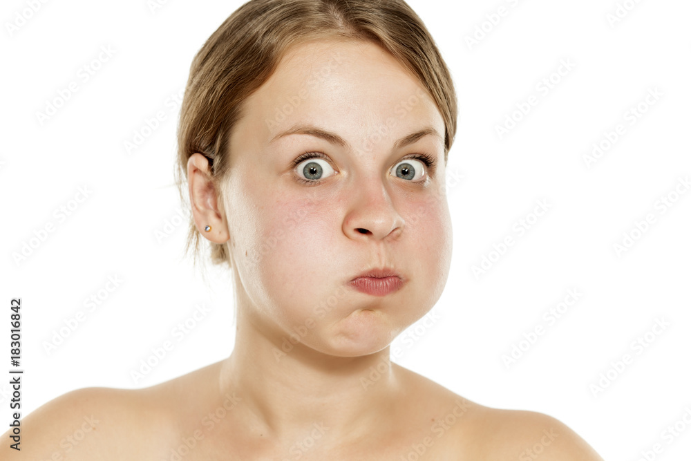 Morning exercise for the facial skin on white background, blowing. Morning exercise for the facial skin on white background, blowing.