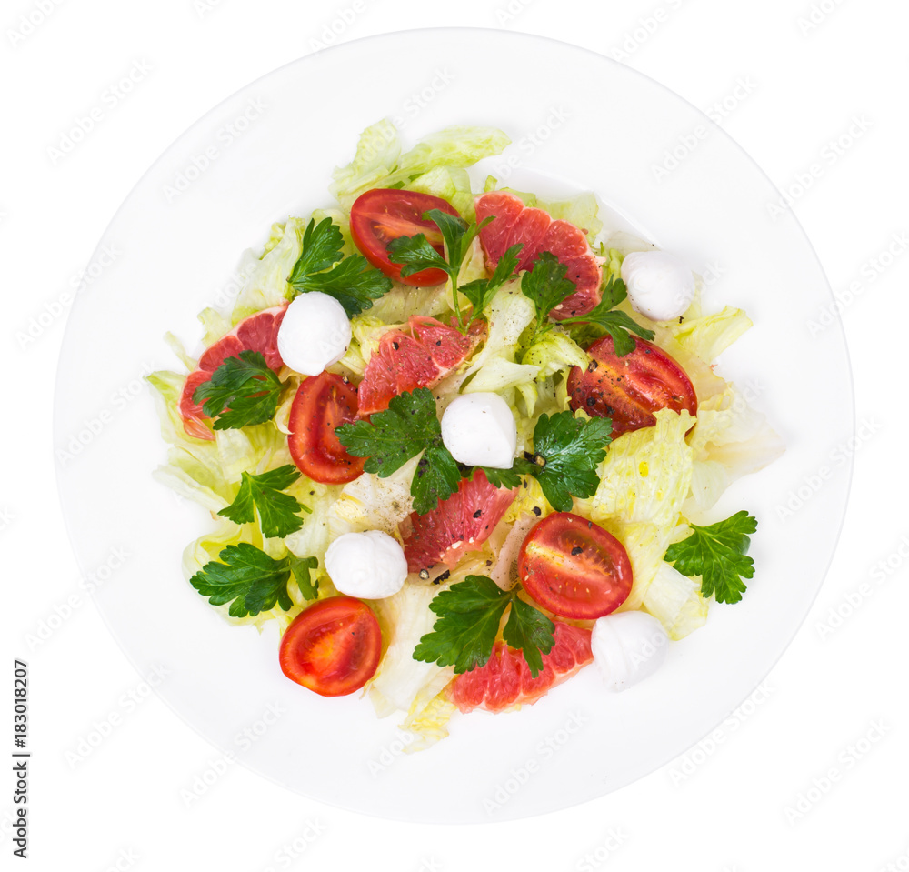 Vegetarian salad from cabbage, tomatoes and grapefruit