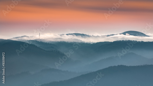 Misty sunrise landscape from Luban peak in Gorce mountains, Poland © nioloxs
