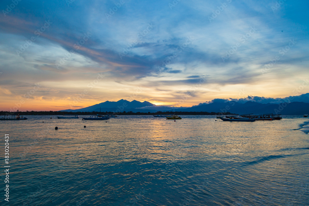 Fototapeta premium Beatiful sunrise at Gili Trawangan with Rinjani mount in background, Indonesia