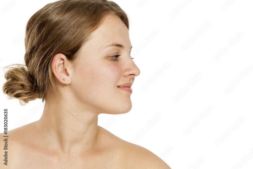 profile portrait of smiling young woman withhout makeup profile portrait of smiling young woman withhout makeup