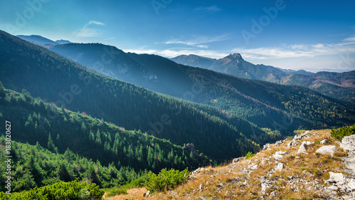 Mountain peak Giewont from between hillocks defile. Tatra mountains, Poland