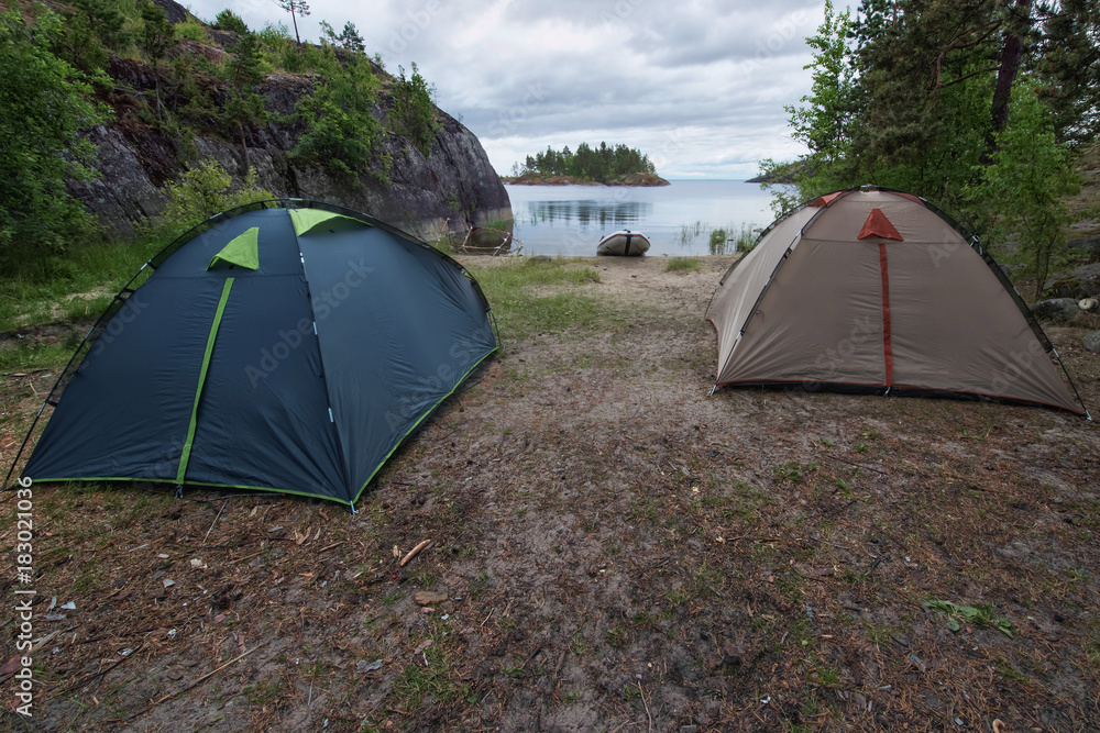 Tourist camp at the river or lake bank