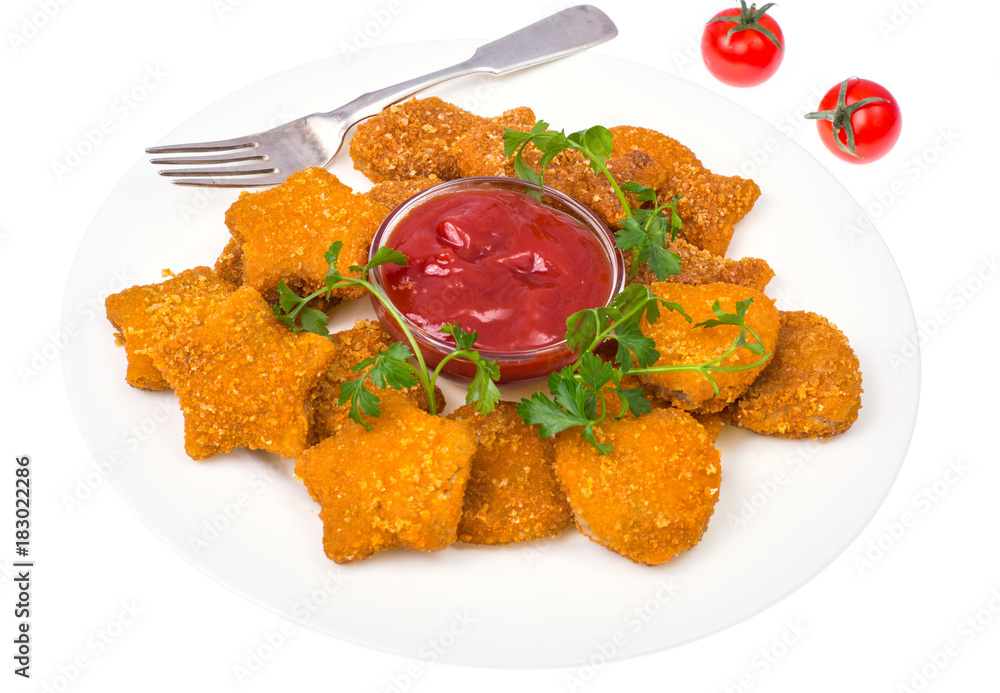 Nuggets of different shapes with ketchup on white background Nuggets of different shapes with ketchup on white background