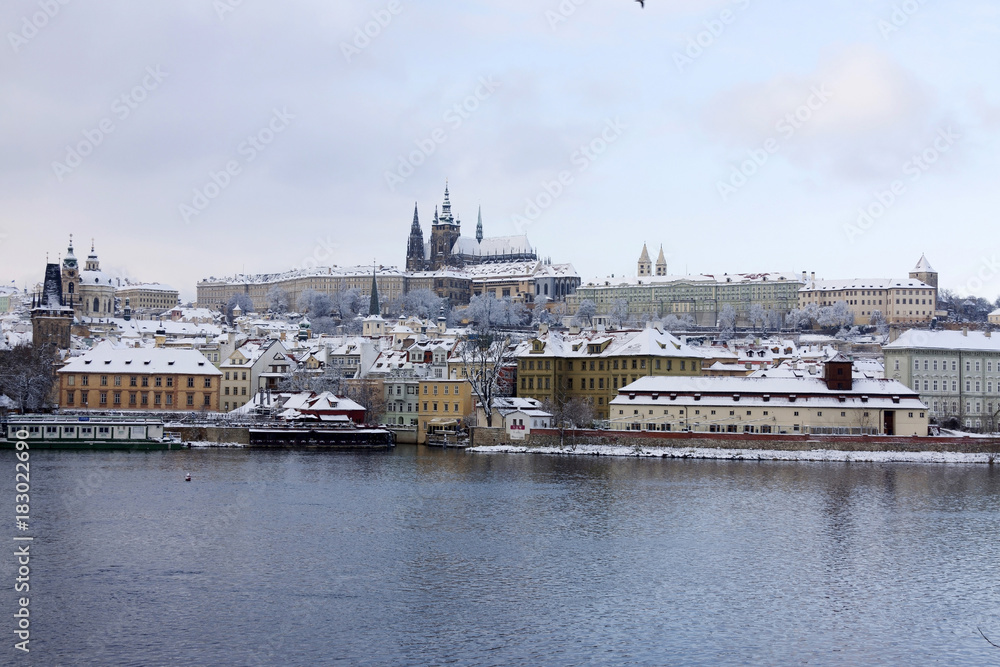 Christmas snowy Prague Lesser Town with gothic Castle, Czech republic