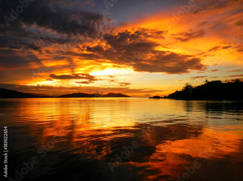 Colorful sunset at Nananu-i-Ra Island, Fiji © donyanedomam
