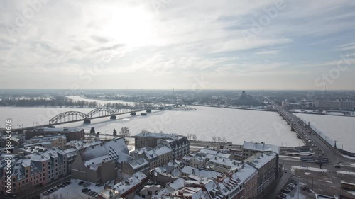 Riga Down Town Cathedral Dome Daugava river and bridges timelapse, winter time-lapse, train bridge photo