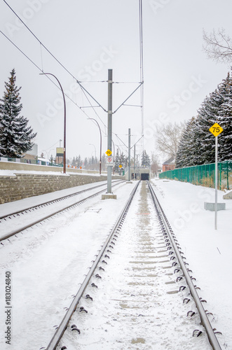 Light Rail Tracks on a Snowy Day. Calgary, AB, Canada.