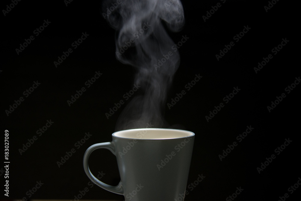 steam from mug on black background steam from mug on black background