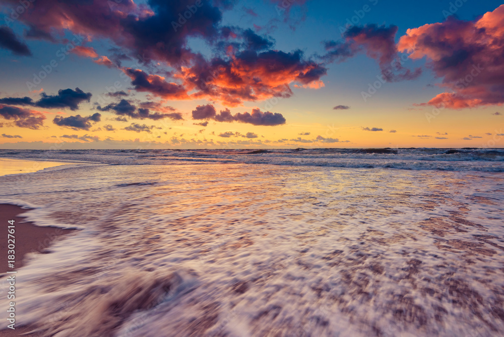 Scenic colorful sunset with amazing clouds over the Baltic sea. Poland. Scenic colorful sunset with amazing clouds over the Baltic sea. Poland.