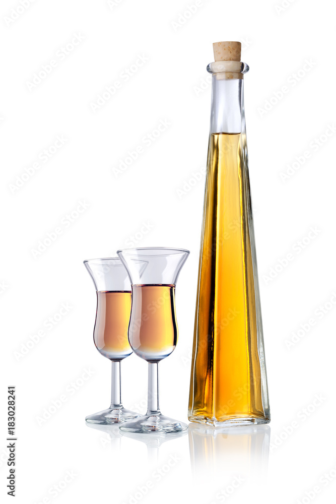 Glas and bottle of liqueur, isolated Glas and bottle of liqueur, isolated