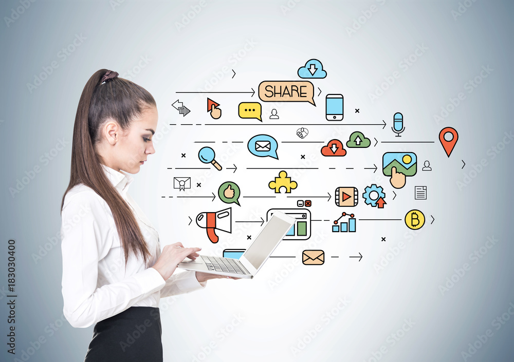 Serious businesswoman, laptop, social media Serious businesswoman, laptop, social media