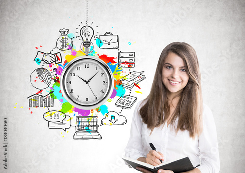 Cheerful young woman, organizer, time management photo