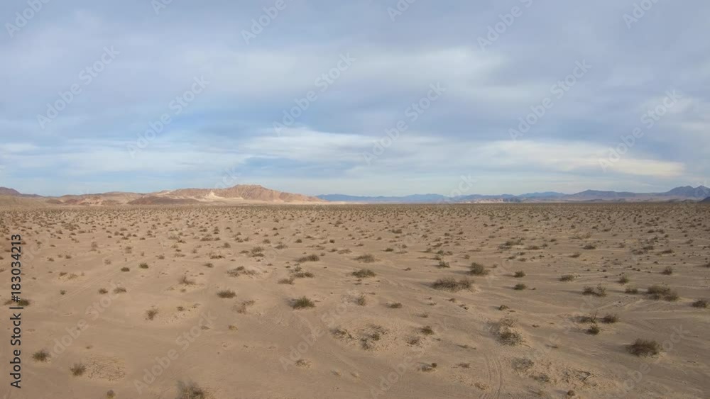 Aerial view of empty Mojave desert landscape between Barstow and Baker in Southern California. Aerial view of empty Mojave desert landscape between Barstow and Baker in Southern California.