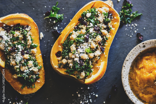 Stuffed Butternut Squash with kale, cranberries, quinoa, and chickpeas