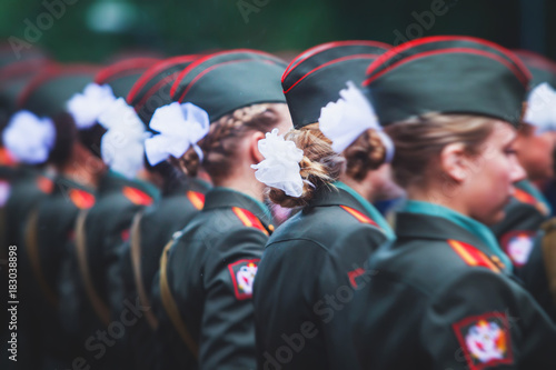 A formation line of female military students with in green uniform, line up during the taking the oath of allegiance ceremony