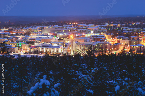Night winter view of Rovaniemi city, Lapland, Finland photo