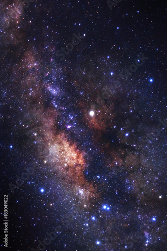 Obraz na płótnie Milky way galaxy with stars and space dust in the universe, Long exposure photograph, with grain. w salonie