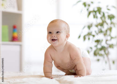 crawling funny baby boy at ...