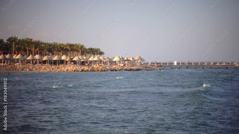 People on holiday enjoy the air and sea breeze People on holiday enjoy the air and sea breeze