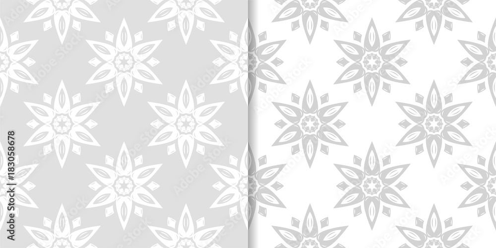 Light gray floral backgrounds. Set of seamless patterns Light gray floral backgrounds. Set of seamless patterns