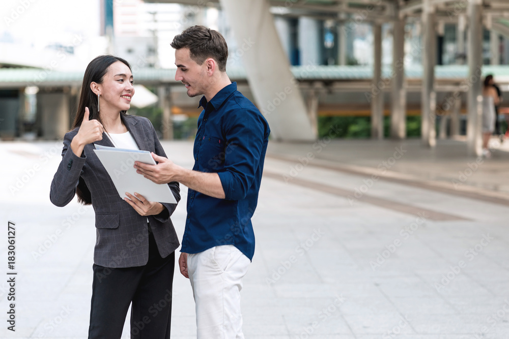 Sale woman trying to sell insurance to potential male client. Sale woman trying to sell insurance to potential male client.