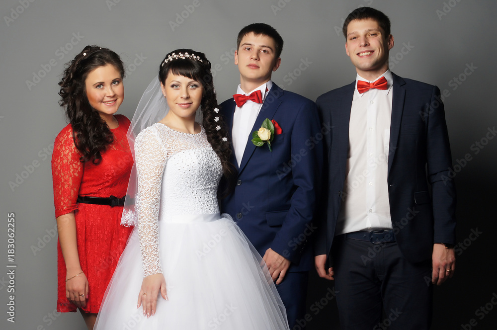 beautiful bride with her girlfriends posing at studio beautiful bride with her girlfriends posing at studio