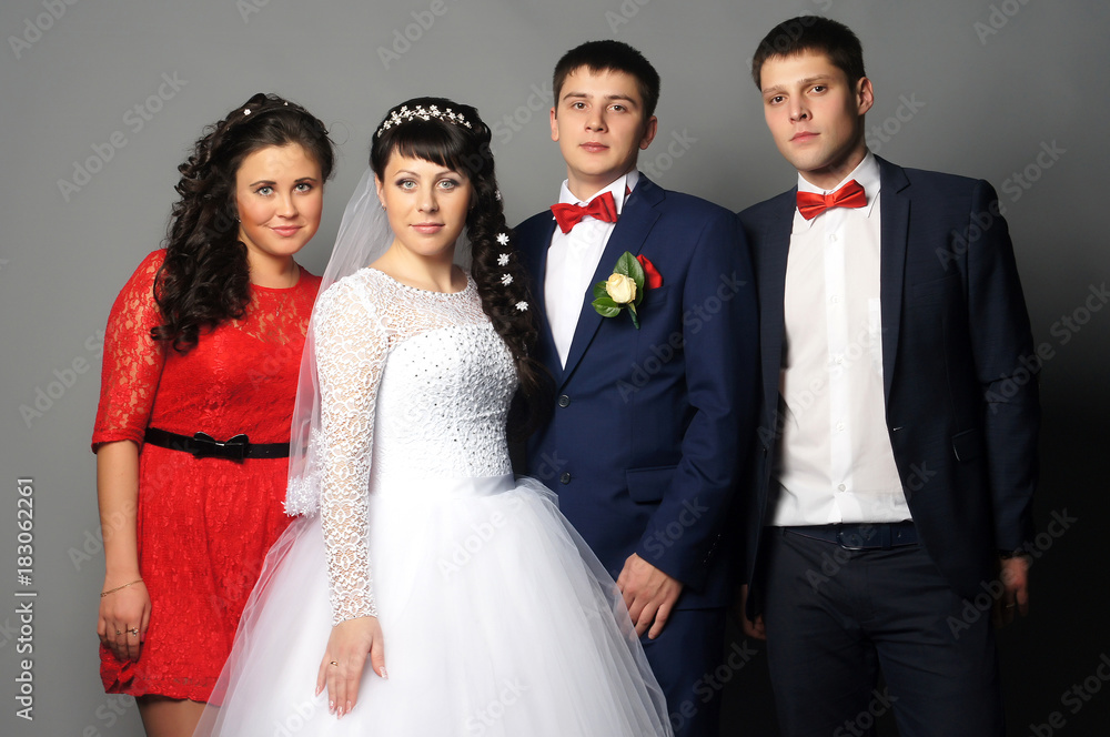 beautiful bride with her girlfriends posing at studio beautiful bride with her girlfriends posing at studio