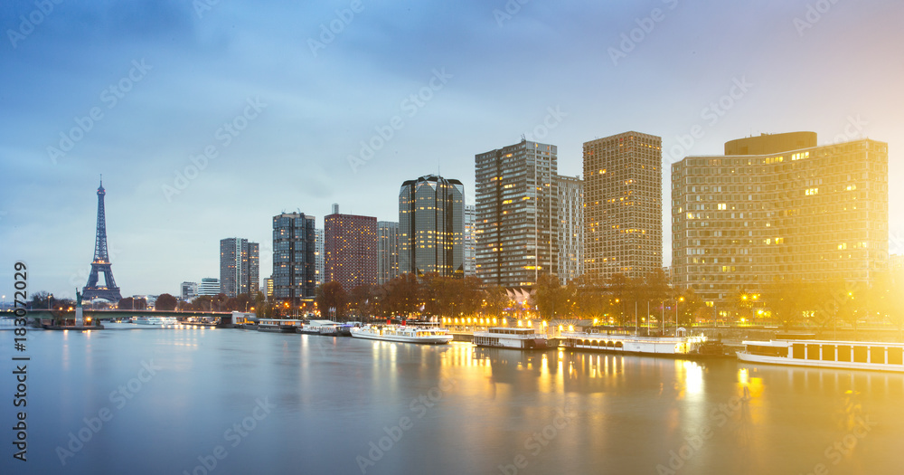 Fototapeta premium Eiffel tower, Beaugrenelle district and Seine river in Paris, France