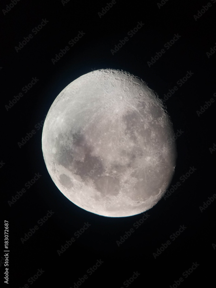 Naklejka premium A photo of the moon made through a telescope