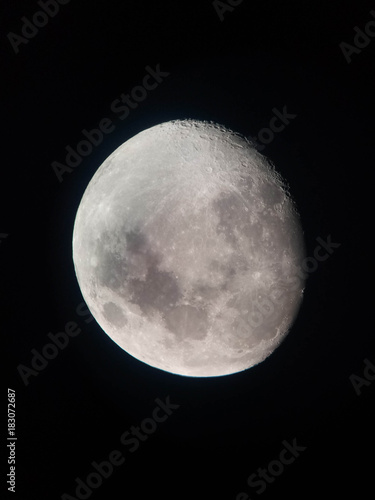 A photo of the moon made through a telescope